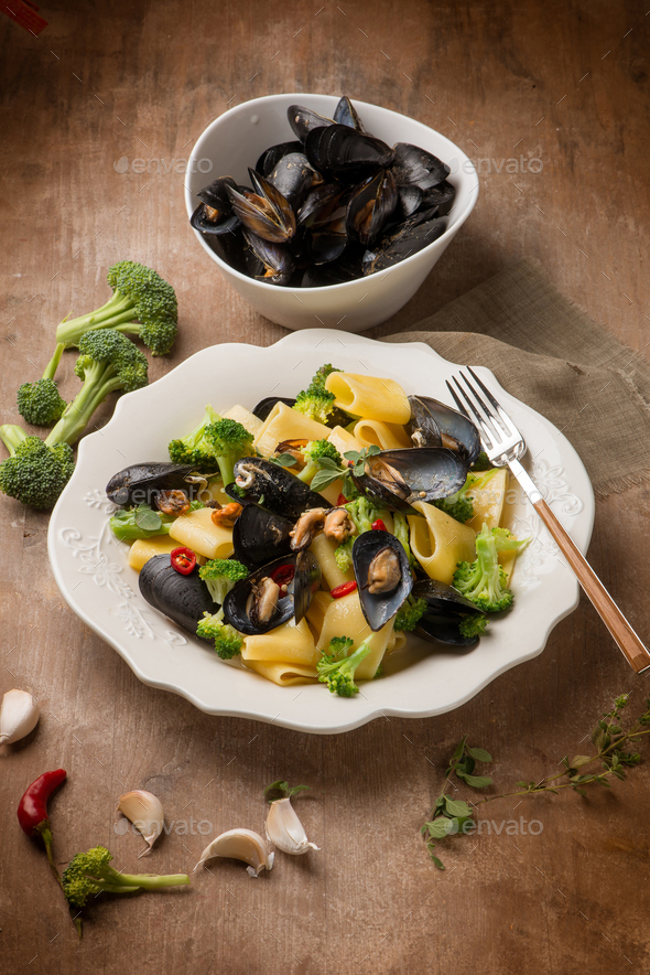 pasta with broccoli and mussel Stock Photo by PhotoDune